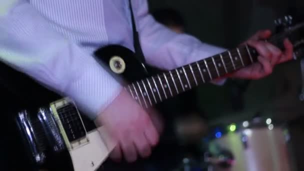 Man playing electric guitar in pub - Footage, Video