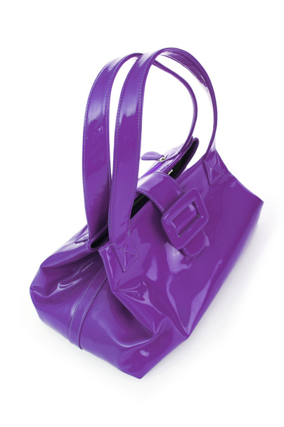 Женский аксессуар - стильная сумка на белом
 - Фото, изображение