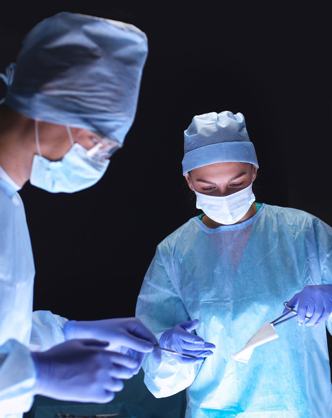 Team surgeon at work in operating room. - Foto, Imagem