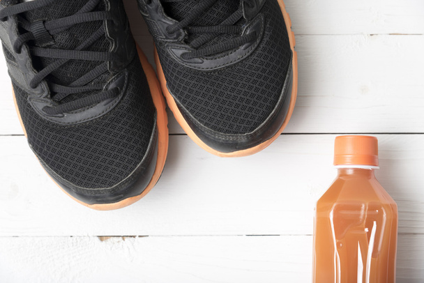 running shoes and orange juice - Photo, Image