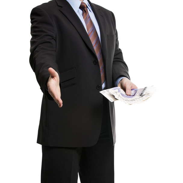 Un hombre de negocios irreconocible con traje oscuro muestra una extensión de 2
 - Foto, imagen