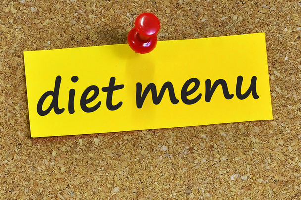 diet menu word on yellow notepaper with cork background - Fotó, kép