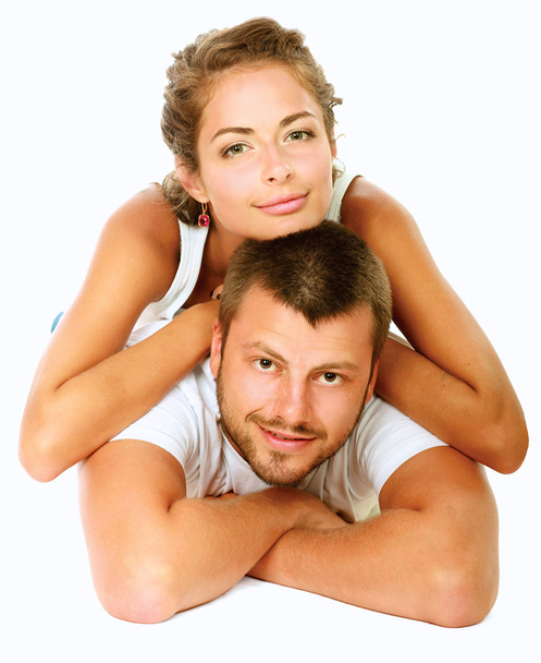 Young man and woman together over white background - Fotoğraf, Görsel