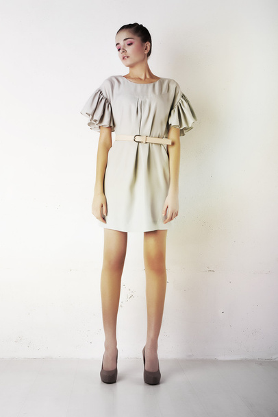Beauty girl in contemporary dress posing - Valokuva, kuva
