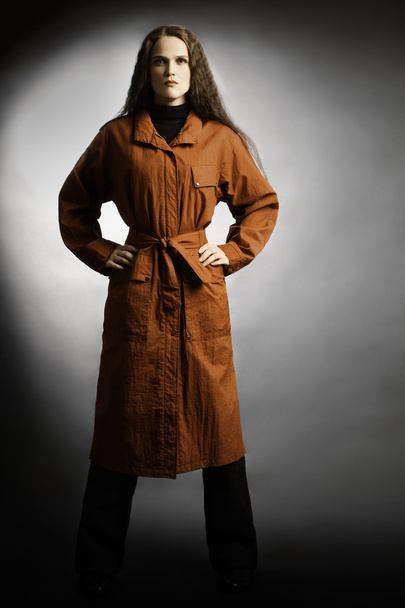 Raincoat. Woman in rain coat waterproof - 写真・画像