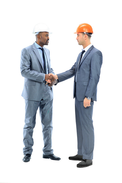 Two businessman shaking their hands - Фото, изображение