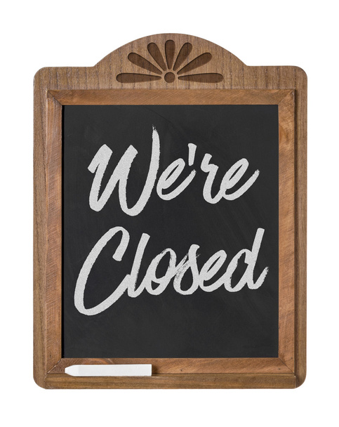 A chalkboard sign on a white background - We are closed - Photo, Image