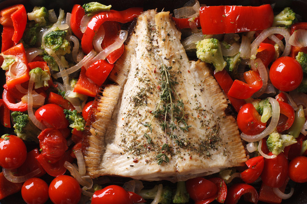 Tasty flounder with vegetables close-up. horizontal top view - Photo, Image