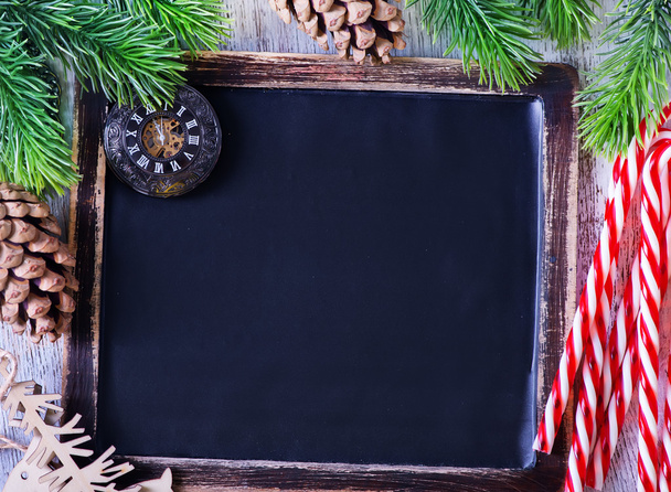 empty blackboard, candy canes - Фото, изображение