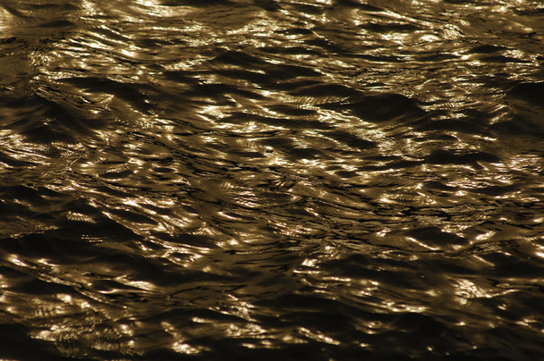 A nap fény, a víz hullámok - Fotó, kép