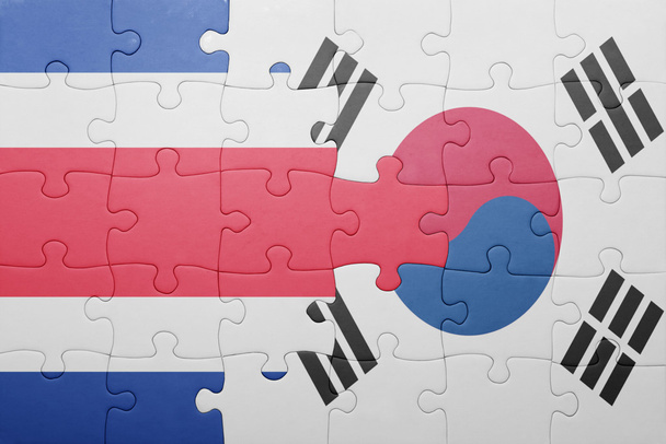 puzzle con la bandiera nazionale di Costa rica e Corea del Sud
 - Foto, immagini