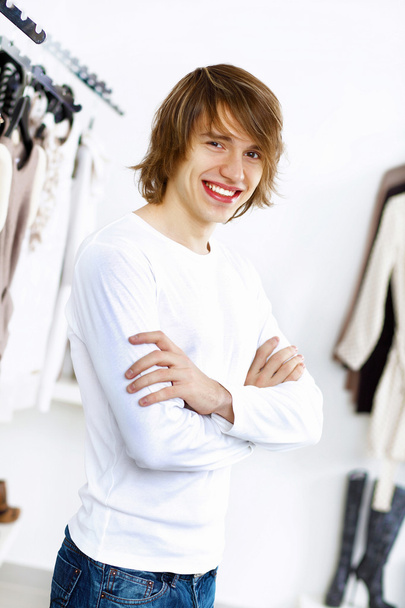 Young man doing shopping - 写真・画像