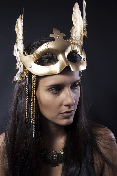 Young woman with golden mask - Foto, Imagem