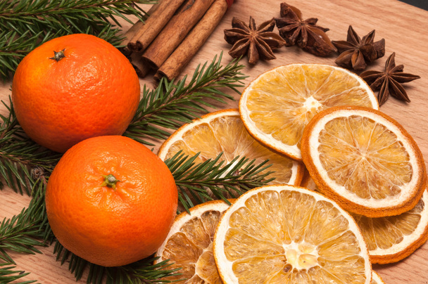 Christmas composition - cones, orange, anise, cinnamon, fir tree branch. - Fotoğraf, Görsel