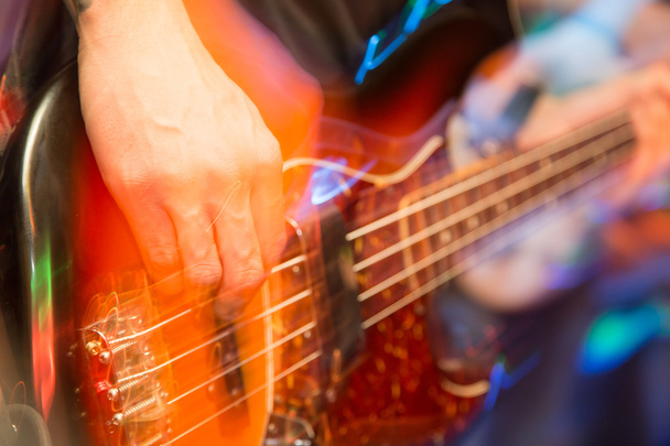aggressive play guitar on stage - Фото, изображение
