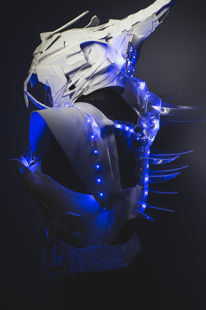 robotic spacesuit with blue lights - 写真・画像