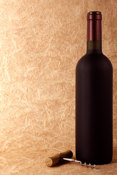 Korkenzieher und Flasche Wein - Foto, Bild