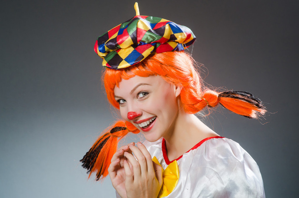 Clown in funny concept on grey background - Photo, Image