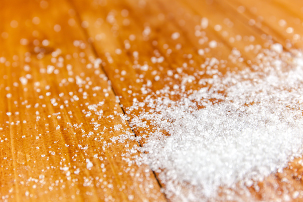 Granulated White Sugar Spill over Wooden Background - Photo, Image