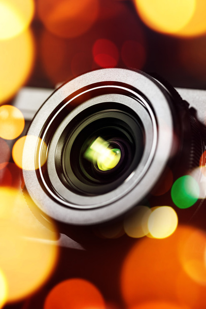 Compact camera lens with bokeh light - Foto, Imagen