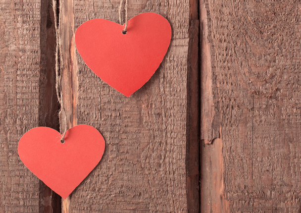 vintage red hearts on wooden background - Fotografie, Obrázek