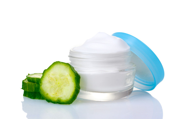 Cream and fresh sliced cucumber isolated on white - 写真・画像