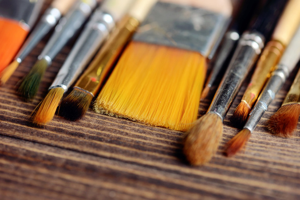 brushes on wood background - Foto, immagini