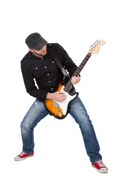 Muzyk gra gitara elektryczna z entuzjazmem. Na białym tle - Zdjęcie, obraz