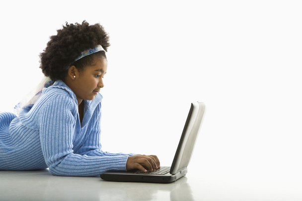 Girl on computer. - Фото, изображение