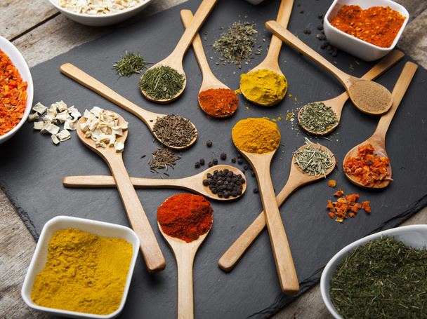 Powder spices on spoons and bowl - Photo, Image