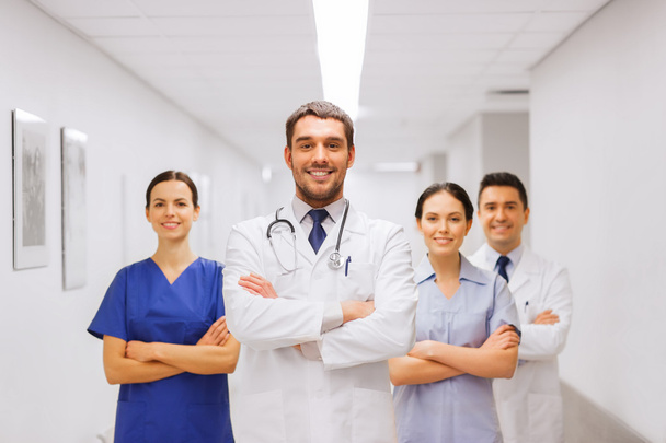happy group of medics or doctors at hospital - 写真・画像