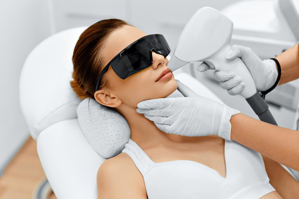 Face Care. Facial Laser Hair Removal. Epilation. Smooth Skin.  - Foto, afbeelding