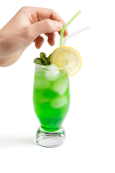 Cocktail with lemon and human hand - Photo, Image