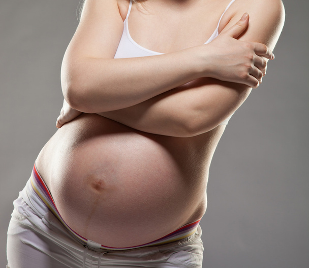 pregnant female belly - Φωτογραφία, εικόνα