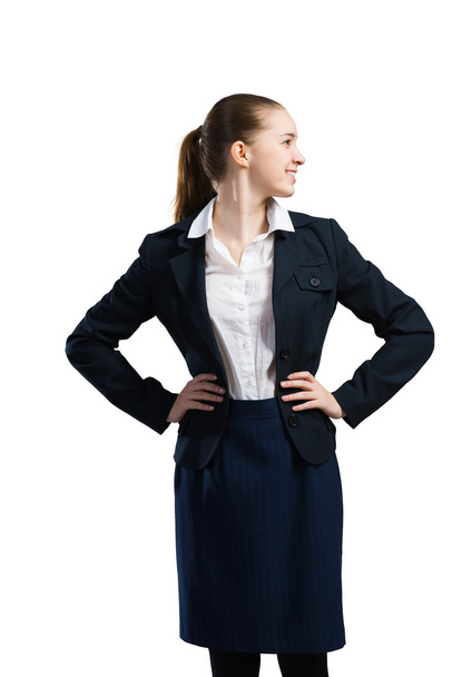 Businesswoman with arms on waist - Фото, зображення