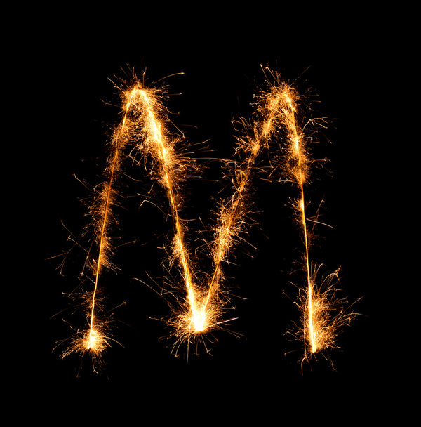 Sparkler firework light alphabet M (Capital Letters) at night  - Foto, immagini