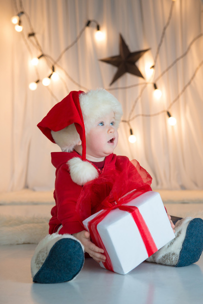 Baby santa with giftbox - 写真・画像