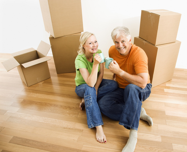 Couple with moving boxes. - Photo, image