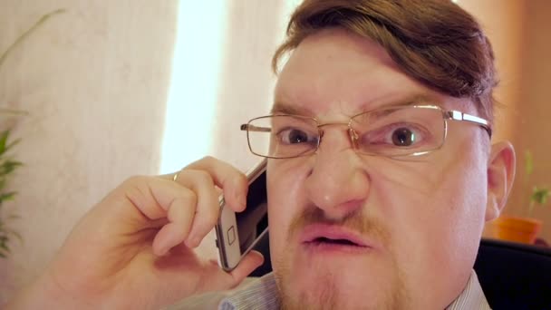 Very Angry Crazy eye businessman in glasses - Felvétel, videó