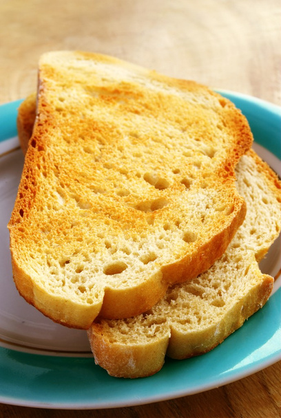 Fried bread in a turquoise plate for breakfast - Fotografie, Obrázek