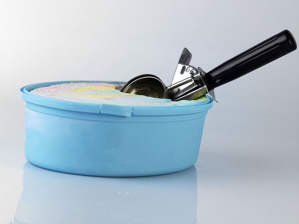 Blue tub of ice cream - Photo, image