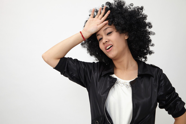 Girl wearing huge afro wig - Valokuva, kuva