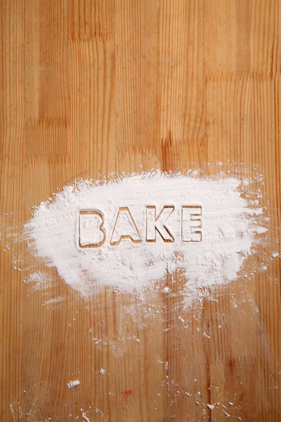 flour with word BAKE - Valokuva, kuva