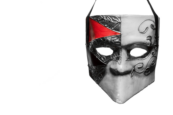 Máscara veneziana pendurada
 - Foto, Imagem