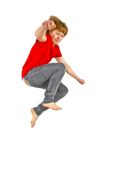 portrét dospívající chlapce, skákat do vzduchu - Fotografie, Obrázek