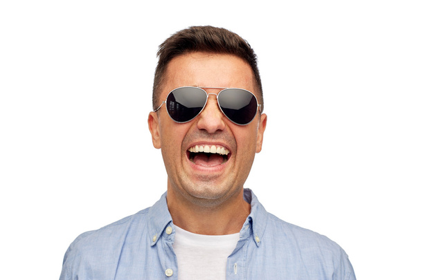 face of smiling man in shirt and sunglasses - Fotoğraf, Görsel