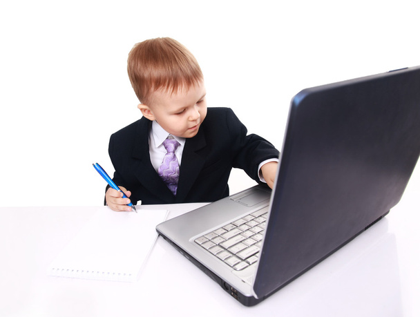Happy boy using laptop computer - Фото, зображення