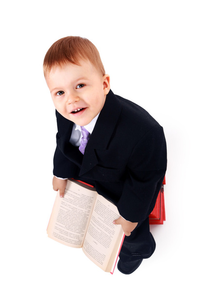 Boy with books for an education portrait - isolated over a white background - Fotoğraf, Görsel
