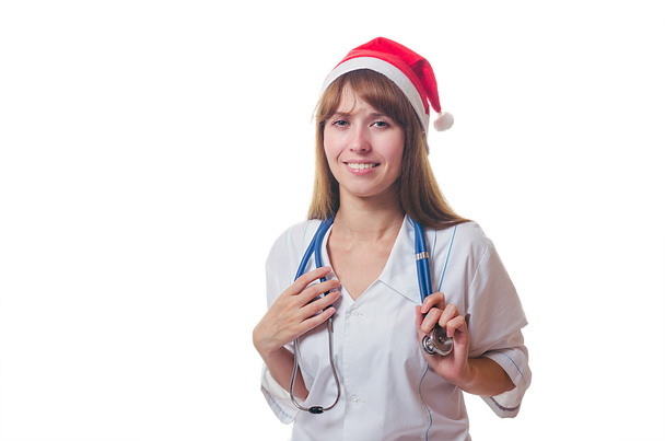 Der Arzt in der Neujahrsmütze lächelt - Foto, Bild