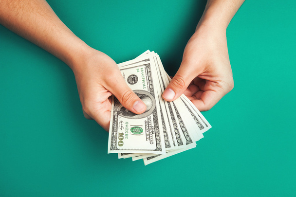 Counting money with hands - Φωτογραφία, εικόνα